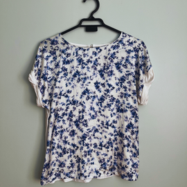 Blusa floreada Mujer.